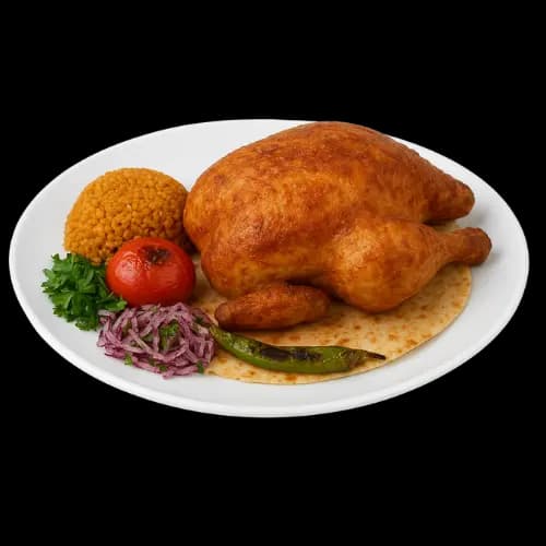 Közde tüm piliç; bulgur pilavı, köz domates, sumaklı soğan ve lavaş ile